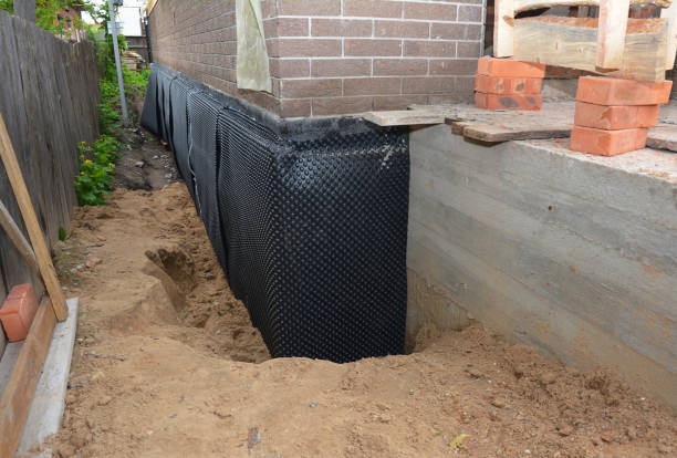 SJ Waterproofing Pros technician performing targeted Emergency Waterproofing assessment in Republic, WA